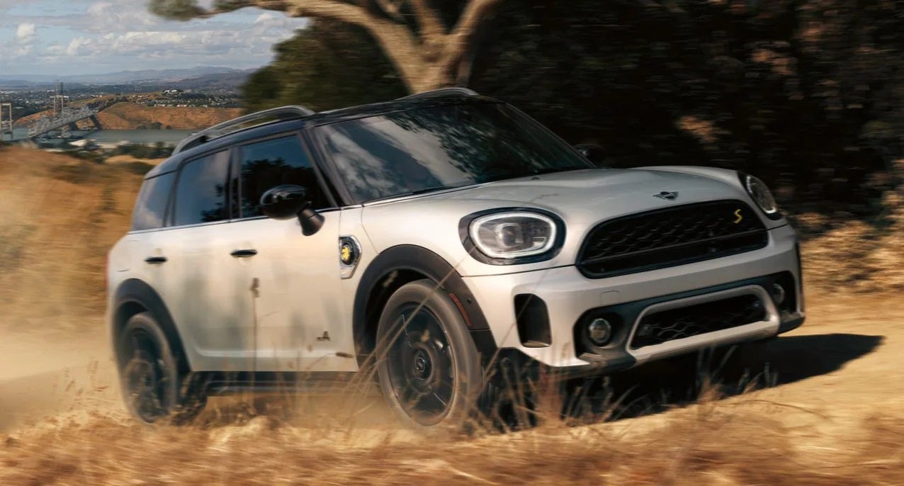 The MINI Cooper SE Countryman PHEV driving on dirt terrain. MINIDemo3 in Derwood MD